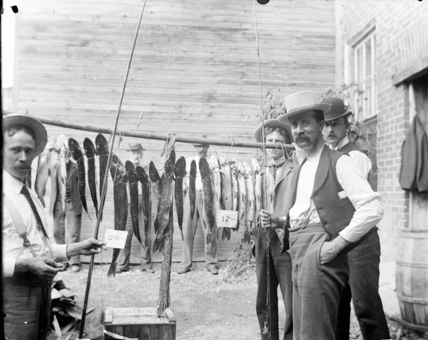 a group of men standing next to each other