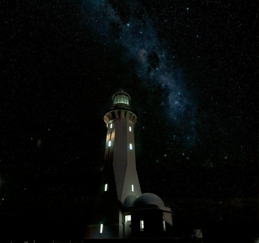 photo of white painted lighthouse