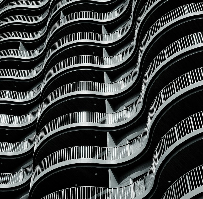 a tall building with balconies and balconies on it