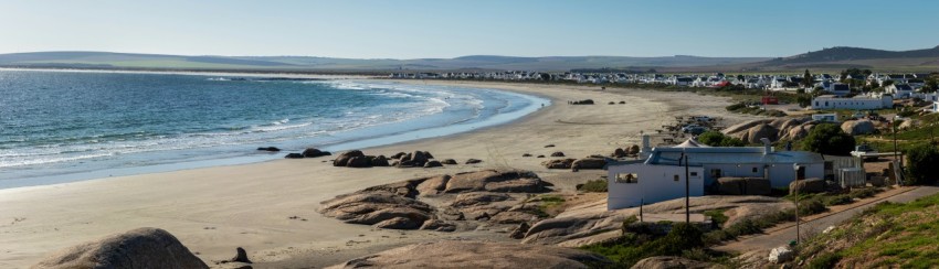 an aerial view of a beach and ocean