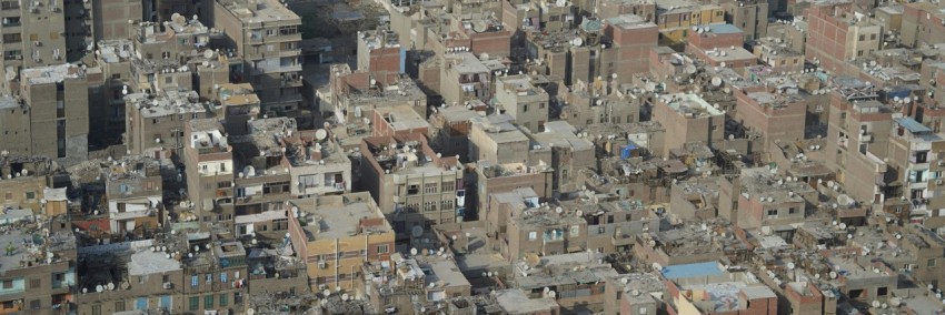 an aerial view of a city with lots of buildings