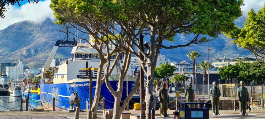 a boat docked at a pier