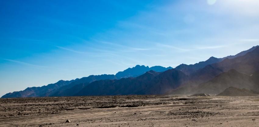 a landscape with hills in the back