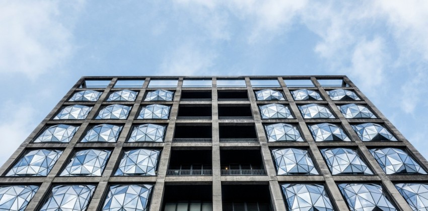 gray concrete building under blue sky during daytime