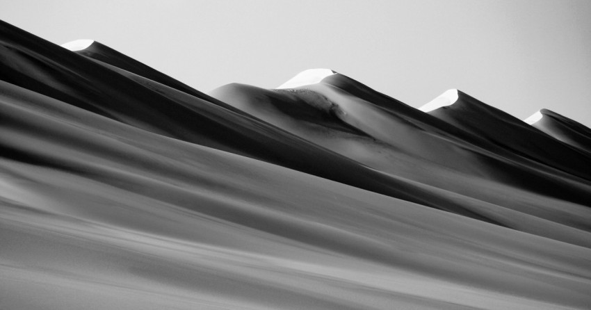 grayscale photo of desert during daytime