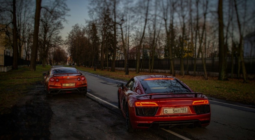 a couple of cars parked on the side of the road NZlQP