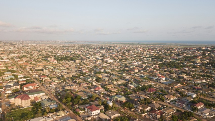 an aerial view of a city with lots of houses