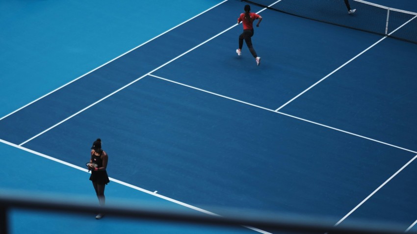 two person playing tennis during daytime btr4w