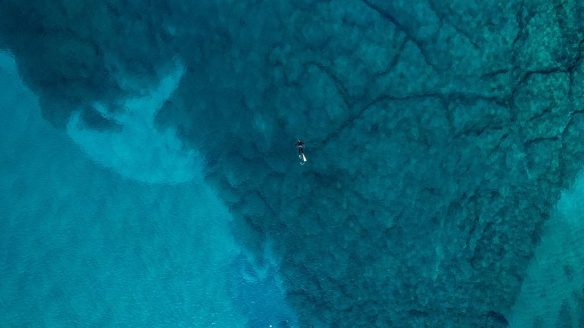 a person standing on a rock