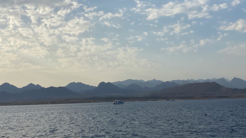 a large body of water surrounded by mountains