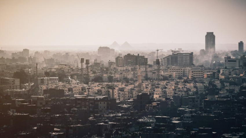 a view of a city with tall buildings