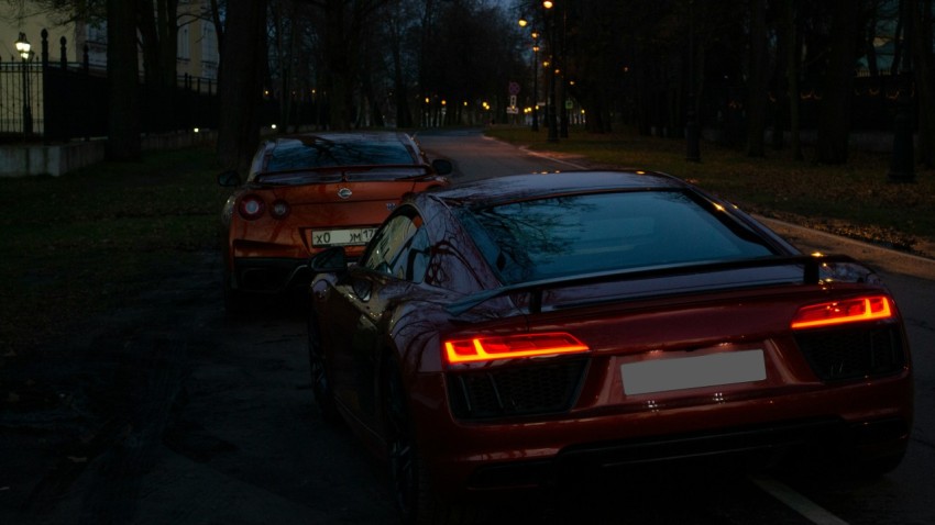 a couple of cars parked next to each other