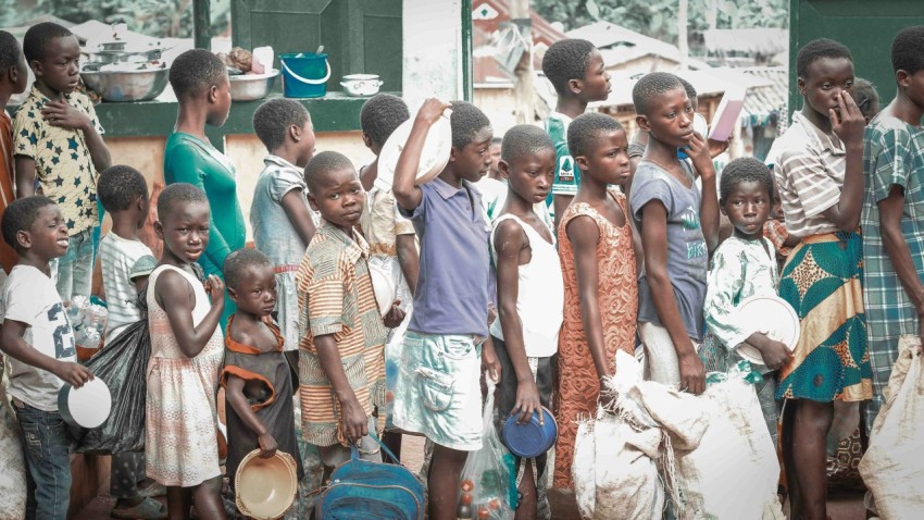 a group of children standing next to each other