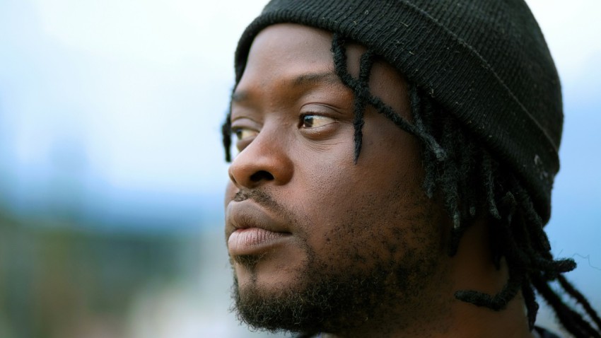 a close up of a person wearing a hat