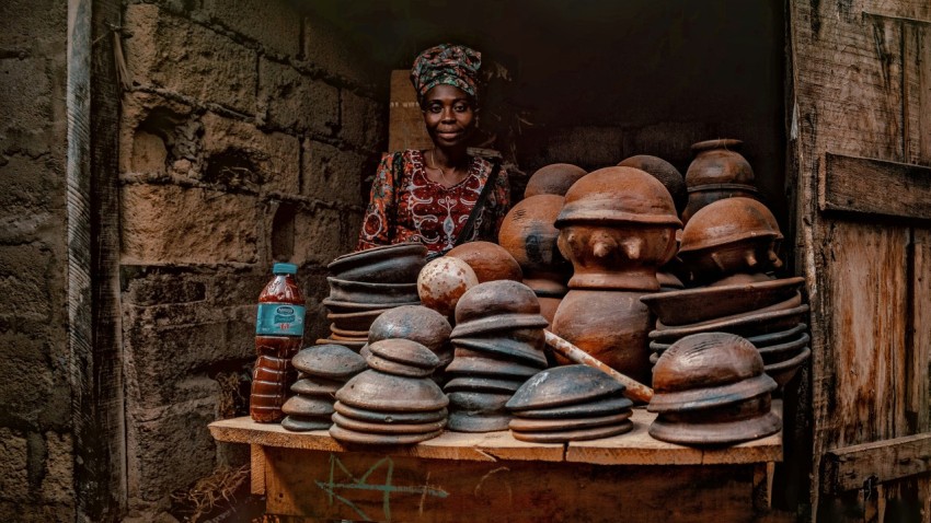 brown and gray ceramic jars on brown wooden table