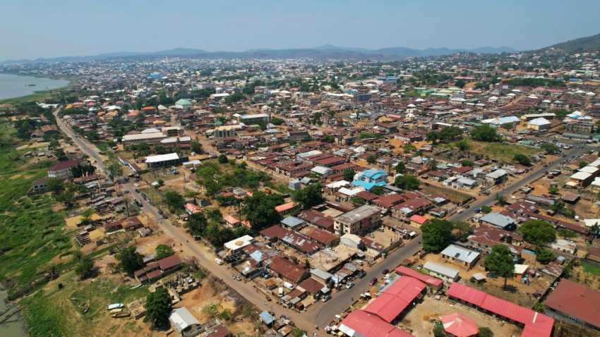 an aerial view of a city with a river running through it