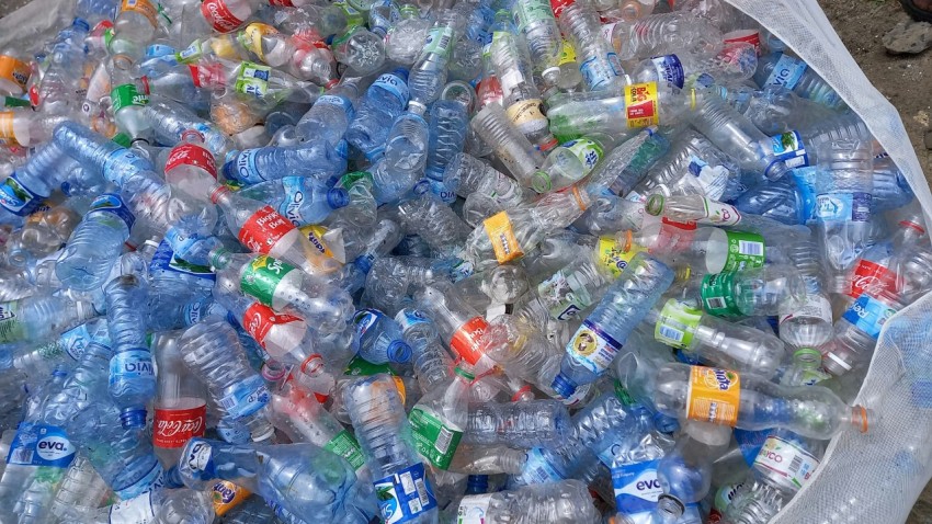 a large amount of bottled water in a plastic container