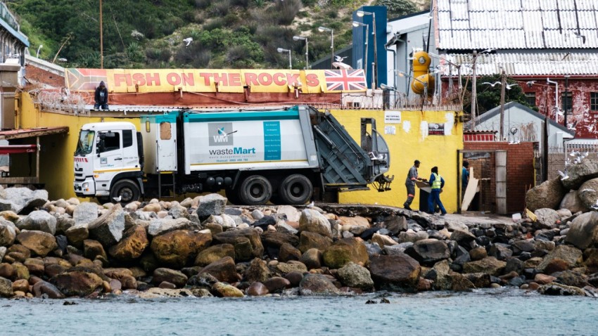 a truck parked on rocks a