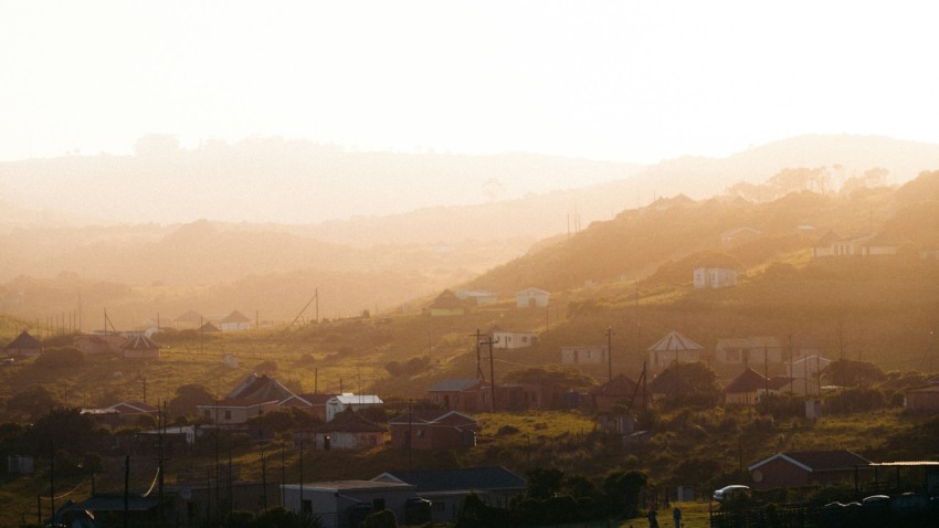 a view of a small town on a hill