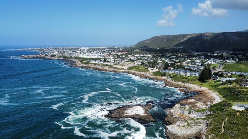 an aerial view of the ocean and coastline