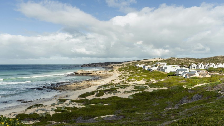 a view of a beach from a hill