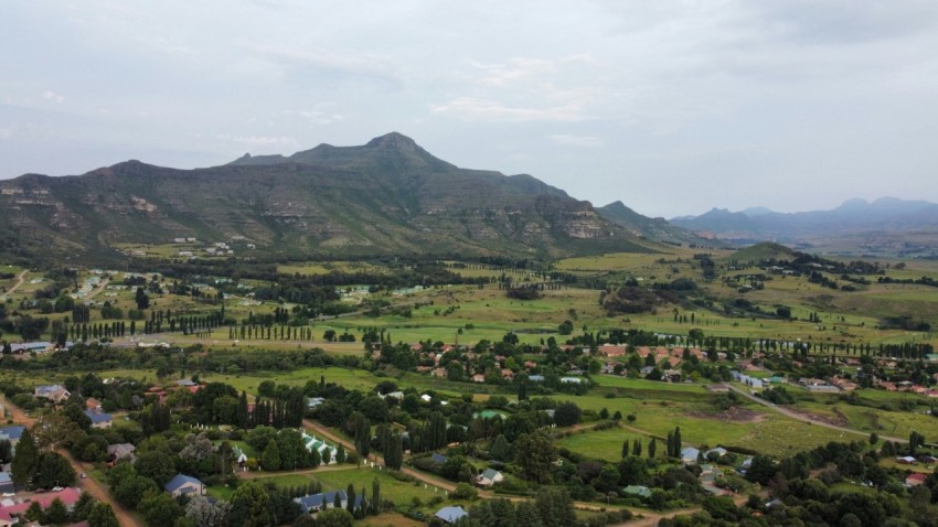 an aerial view of a small town in the mountains