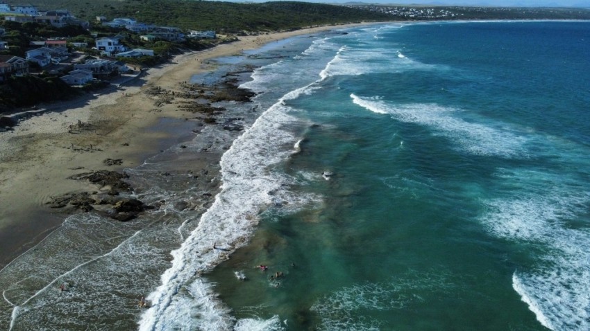 an aerial view of a beach and ocean 36Y1ju90M