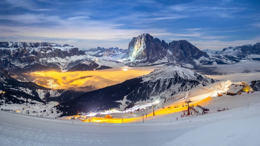 a snow covered mountain with a sky background qyFf