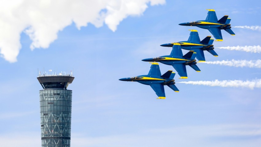 a group of fighter jets flying in formation