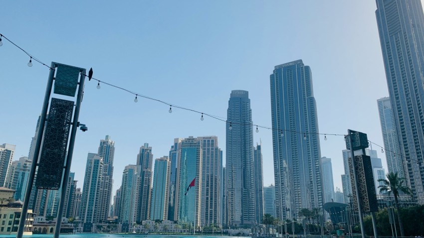 a view of a city with tall buildings in the background