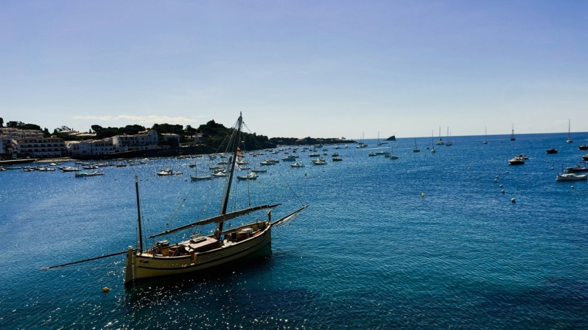 a boat floating on top of a body of water