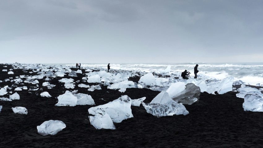 people on ice covered field during daytime