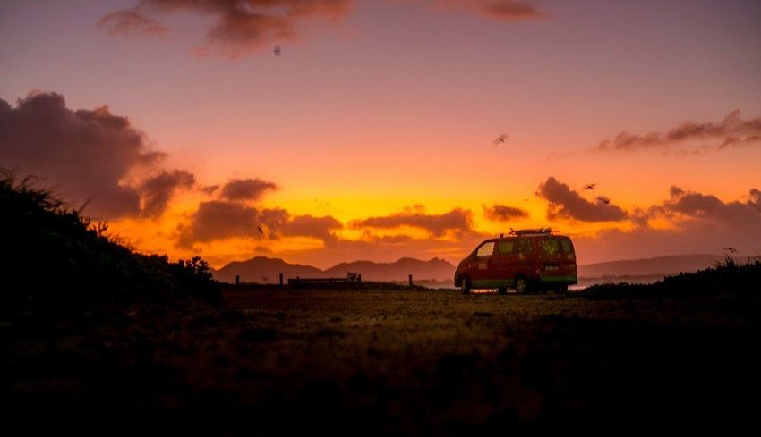 a van parked in a field fpU02