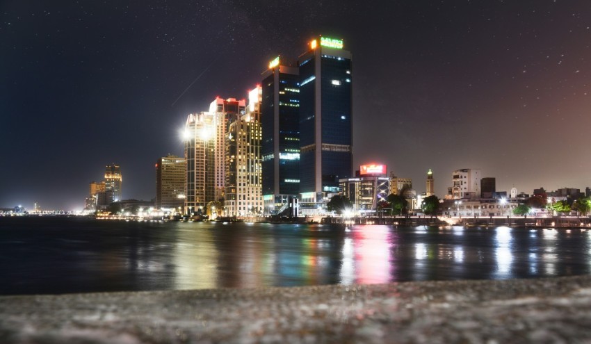 a view of a city at night from across the water