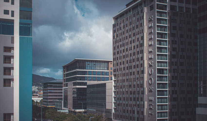 a view of some very tall buildings in a city rMR9ympp