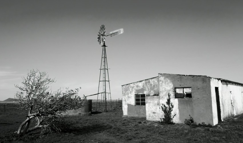 grayscale photo of concrete building