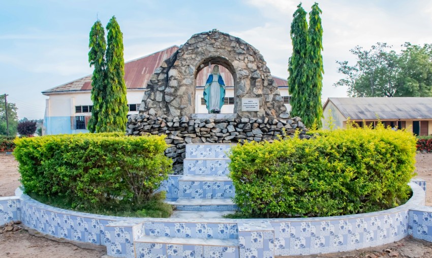 a stone church with a stone staircase leading up to it