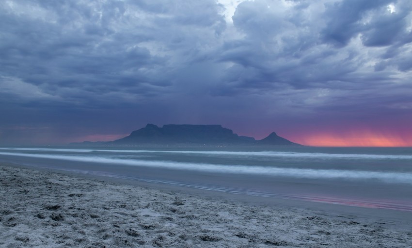mountain and sea waves on shore