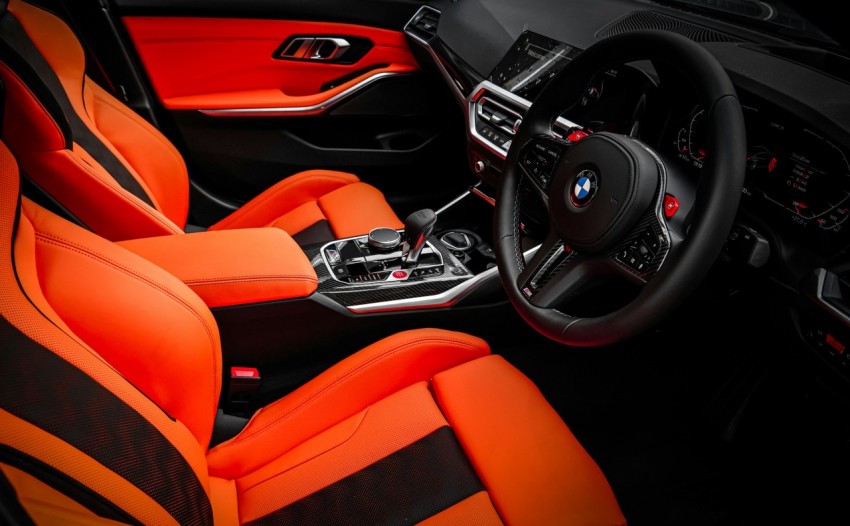 red and black bmw car interior aMNLNcgE