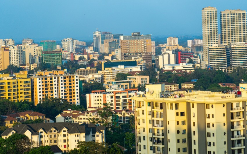 a view of a city with tall buildings LL6