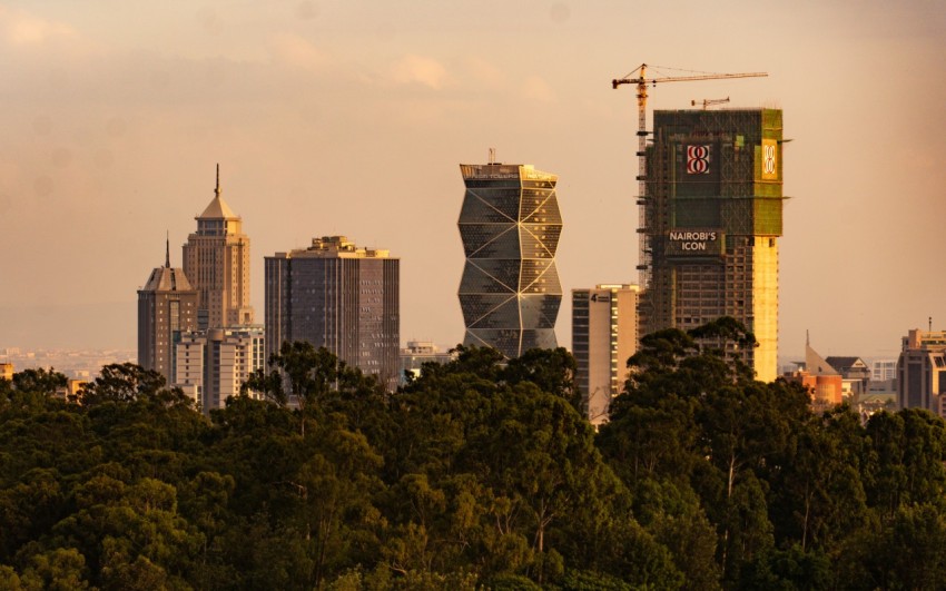 a view of a city with tall buildings in the background