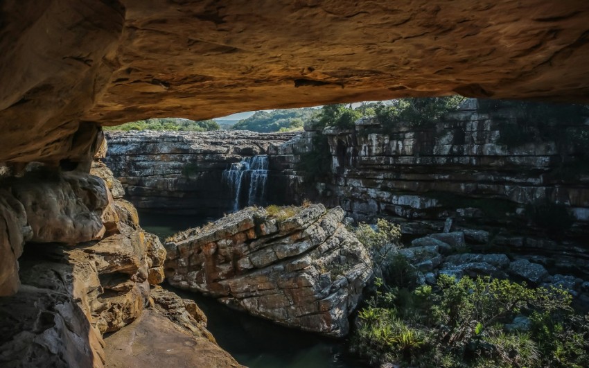 green stones and waterfall