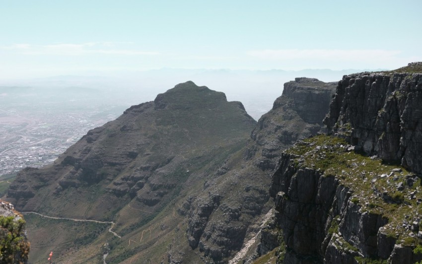 a view of a mountain with a road going through it