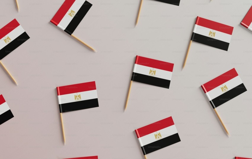 a group of matches with flags on them