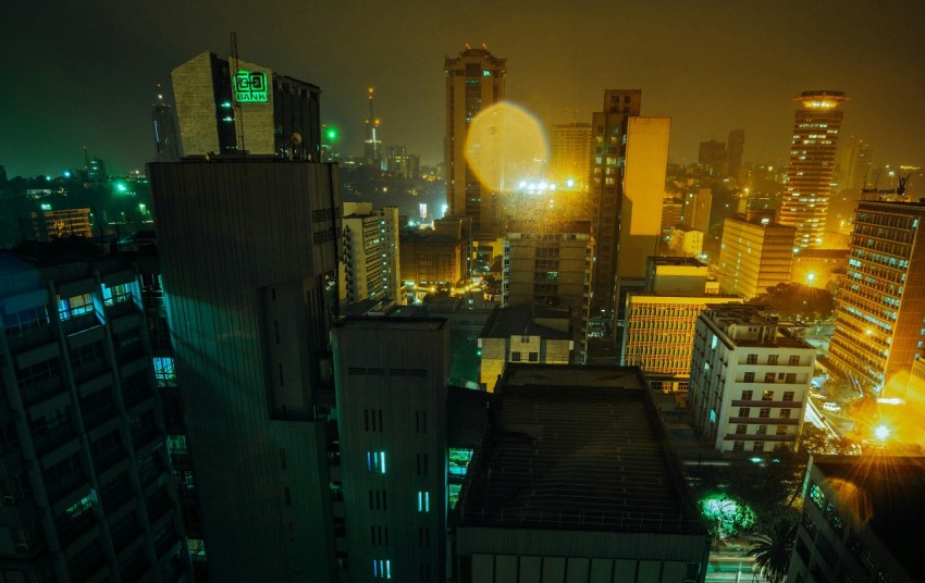 a view of a city at night from the top of a building