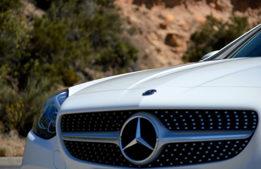 white mercedes benz vehicle