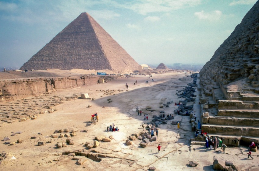 structural shot of brown pyramid under blue sky during daytime