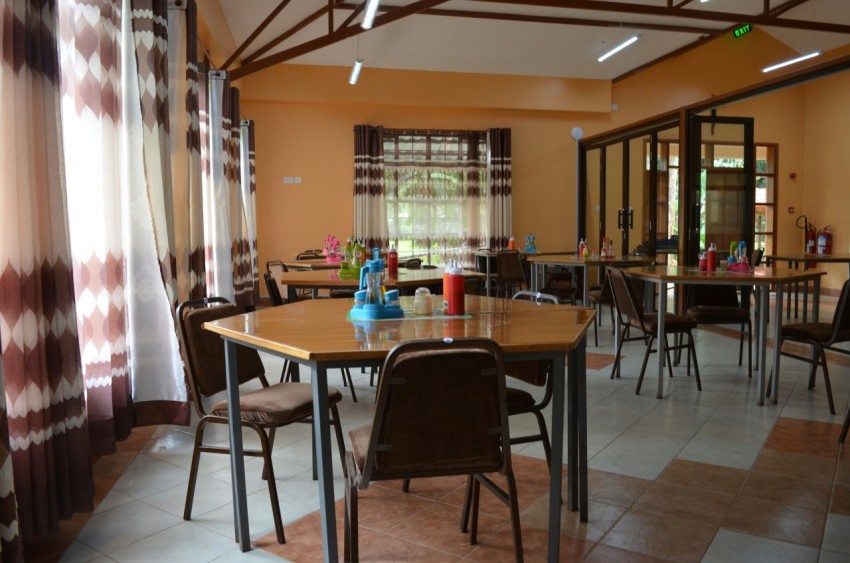 brown wooden table with chairs