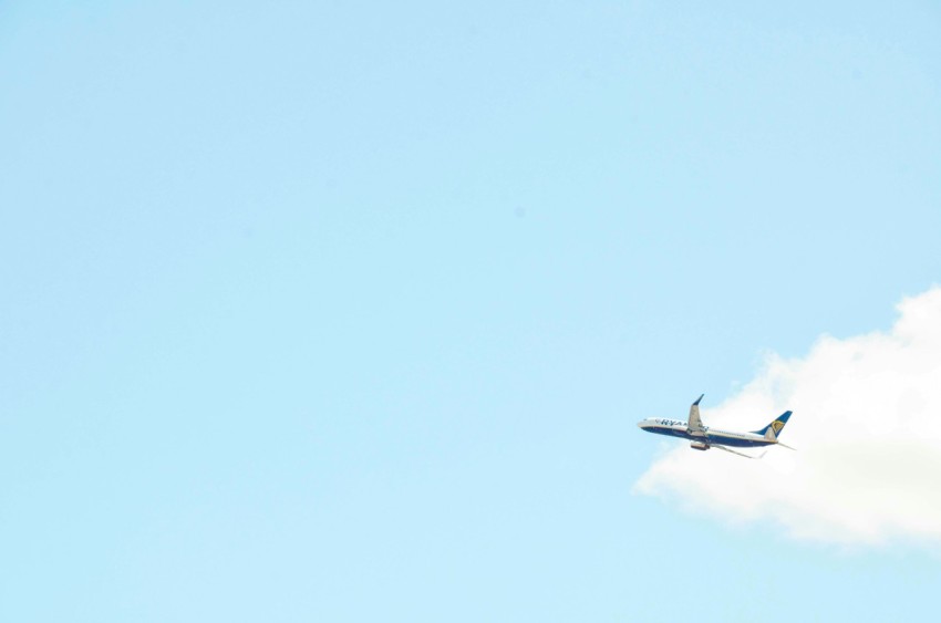 white and blue passenger plane on focus photo