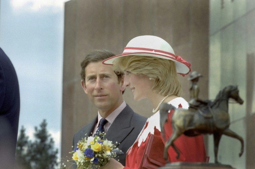 a man and a woman standing next to each other